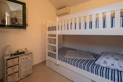 Krevet ili kreveti u jedinici u objektu Family friendly house with a swimming pool Solaris - Sibenik - 24400