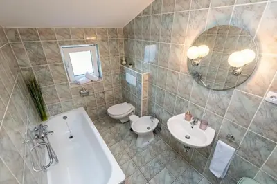 Kupaonica u objektu Apartments with parking space Vodice - 24553