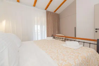 Krevet ili kreveti u jedinici u objektu Dazlina Resort New! 14 guests villa, Breakfast & Pool