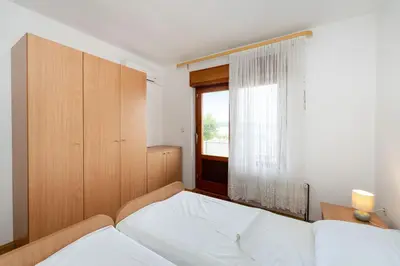 Krevet ili kreveti u jedinici u objektu Spacious Apartments by the Sea in Srima, Vodice