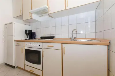 Kuhinja ili čajna kuhinja u objektu Apartments Nada