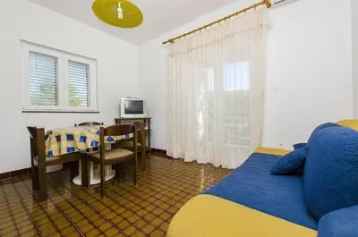 TV i/ili zabavni centar u objektu Apartments Nada