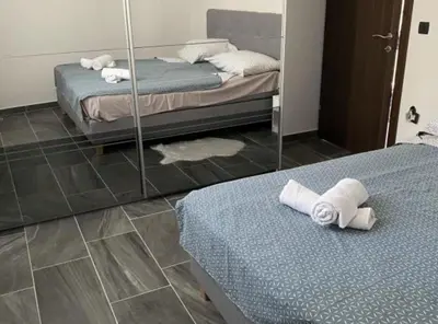 Krevet ili kreveti u jedinici u objektu Apartments Stone House Murter