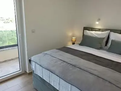 Krevet ili kreveti u jedinici u objektu Villa Sunrise with Outdoor Pool - 4 Bedroom & Pool