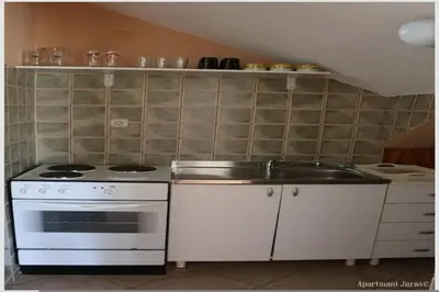 Kuhinja ili čajna kuhinja u objektu Apartments Juras - Studio Apartment with Loggia Ana
