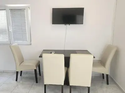 TV i/ili zabavni centar u objektu Apartments Mateo - One Bedroom Apartment - White