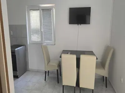 TV i/ili zabavni centar u objektu Apartments Mateo - One Bedroom Apartment - White