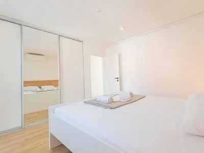 Krevet ili kreveti u jedinici u objektu Holiday Home Iva - Three Bedroom Holiday Home