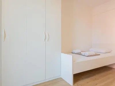 Krevet ili kreveti u jedinici u objektu Holiday Home Iva - Three Bedroom Holiday Home