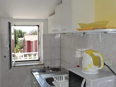 Kuhinja ili čajna kuhinja u objektu Apartments Dana - One Bedroom Apartment 5