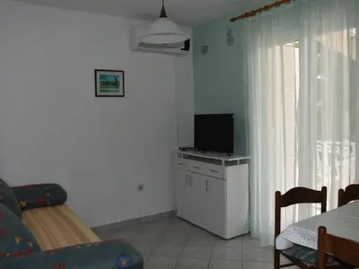 TV i/ili zabavni centar u objektu Apartments Dana - One Bedroom Apartment 2