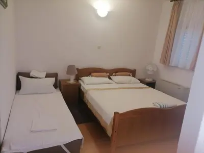 Krevet ili kreveti u jedinici u objektu Apartments Libertas - Studio with Balcony and Sea View - 8