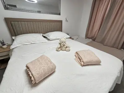 Krevet ili kreveti u jedinici u objektu Betina apartments with parking space near the beach