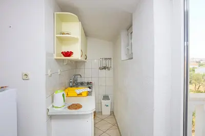 Kuhinja ili čajna kuhinja u objektu Apartments by the sea Rogoznica - 24598