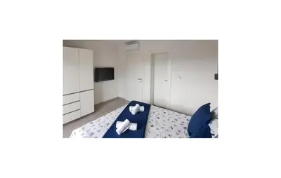 Krevet ili kreveti u jedinici u objektu Awesome Home In Pirovac With Private Swimming Pool, Can Be Inside Or Outside