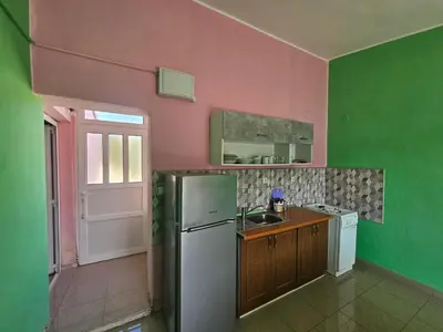 Kuhinja ili čajna kuhinja u objektu Apartmani Autocamp Panorama