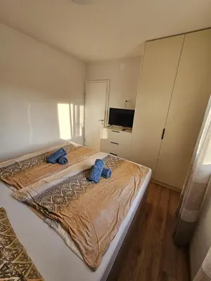 Krevet ili kreveti u jedinici u objektu Ferienwohnung Vodice SJ1