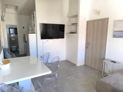 TV i/ili zabavni centar u objektu Apartment Bono 2