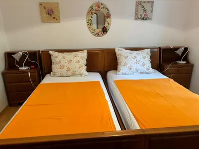 Krevet ili kreveti u jedinici u objektu 3 bedroom Apartment on the sea with garden