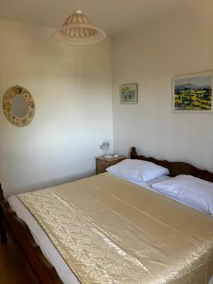 Krevet ili kreveti u jedinici u objektu 3 bedroom Apartment on the sea with garden