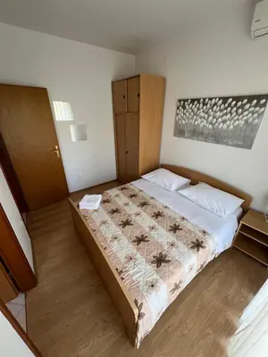 Krevet ili kreveti u jedinici u objektu Sunce economy room with kitchenette