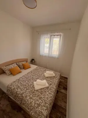 Krevet ili kreveti u jedinici u objektu Apartmani la Barquera