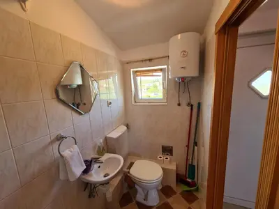Kupaonica u objektu Apartmani Uvodić