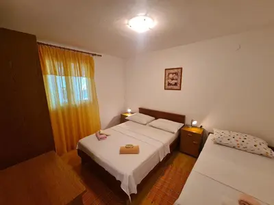 Krevet ili kreveti u jedinici u objektu Apartmani Uvodić