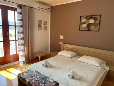 Krevet ili kreveti u jedinici u objektu Rooms Perina Tisno