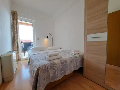 Krevet ili kreveti u jedinici u objektu Apartmani Karmen