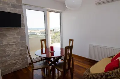 TV i/ili zabavni centar u objektu Villa Kos Murter Apartments