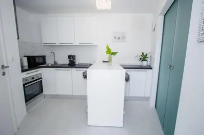 Kuhinja ili čajna kuhinja u objektu Luxury Studio Apartment White Sensation