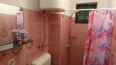Kupaonica u objektu Apartmani Kocka