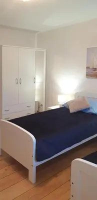 Krevet ili kreveti u jedinici u objektu Apartments Flower terrace