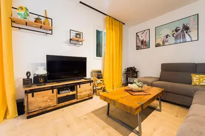 TV i/ili zabavni centar u objektu Holiday in Zečevo