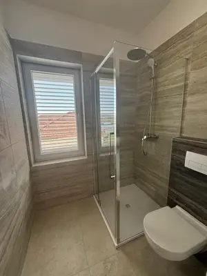 Kupaonica u objektu Villa Regina Apartment Carlito with swimming pool