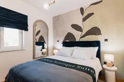 Krevet ili kreveti u jedinici u objektu Calidum Boutique Suites