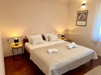 Krevet ili kreveti u jedinici u objektu Apartment TerraSea Tisno