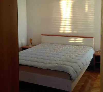 Krevet ili kreveti u jedinici u objektu Beachfront apartments near Šibenik