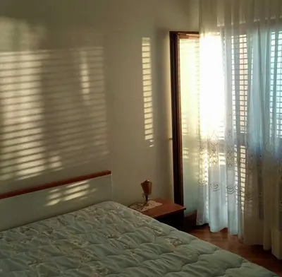 Krevet ili kreveti u jedinici u objektu Beachfront apartments near Šibenik