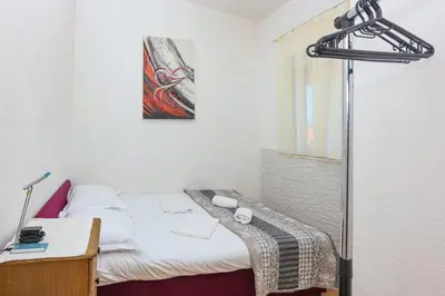 Krevet ili kreveti u jedinici u objektu Apartments with parking space Rogoznica - 24468