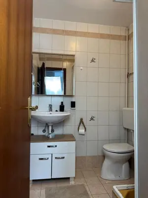 Kupaonica u objektu Strandnahes Apartment in Vodice 1