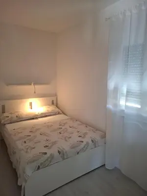 Krevet ili kreveti u jedinici u objektu Monami Apartman Charlie