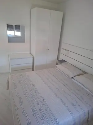 Krevet ili kreveti u jedinici u objektu Monami Apartman Charlie