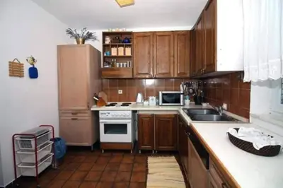 Kuhinja ili čajna kuhinja u objektu Spacious Tisno seaside apartment 6 guests