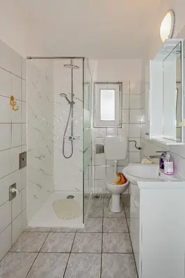 Kupaonica u objektu Spacious Terrace Apartments
