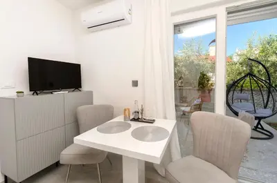 TV i/ili zabavni centar u objektu Apartments Sunny