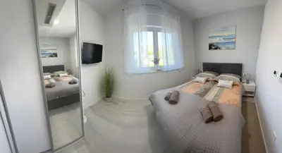 Krevet ili kreveti u jedinici u objektu Villa Ocean View2,Vollausstattung,Pool,Meerblick,Top-Lage