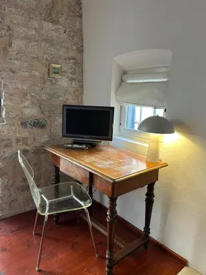 TV i/ili zabavni centar u objektu Bed & Breakfast The Konoba