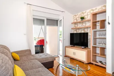 TV i/ili zabavni centar u objektu Apartman XOXO